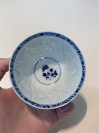 18 Chinese blue and white cups and 16 saucers with floral design, jade mark, Kangxi