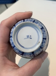 18 Chinese blue and white cups and 16 saucers with floral design, jade mark, Kangxi