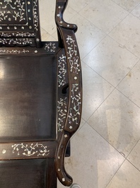 A Chinese mother-of-pearl-inlaid hongmu reclining armchair with a retractable footrest, Canton, 19th C.