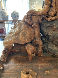 A Chinese carved wooden group and a natural root sculpture, 20th C.