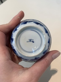 18 Chinese blue and white cups and 16 saucers with floral design, jade mark, Kangxi