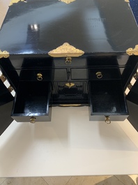 A rare Japanese black-lacquered cabinet with finely engraved gilt mounts, Edo, late 17th C.