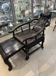 A Chinese mother-of-pearl-inlaid hongmu reclining armchair with a retractable footrest, Canton, 19th C.