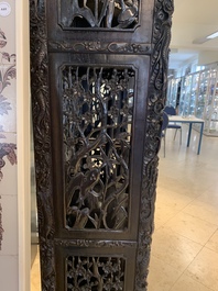 A richly carved Chinese hongmu display cabinet, Canton, 19th C.