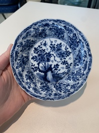 18 Chinese blue and white cups and 16 saucers with floral design, jade mark, Kangxi