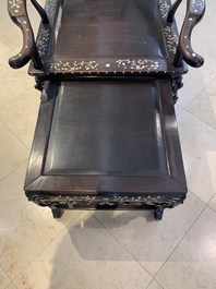 A Chinese mother-of-pearl-inlaid hongmu reclining armchair with a retractable footrest, Canton, 19th C.