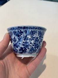 18 Chinese blue and white cups and 16 saucers with floral design, jade mark, Kangxi