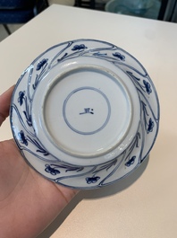 18 Chinese blue and white cups and 16 saucers with floral design, jade mark, Kangxi