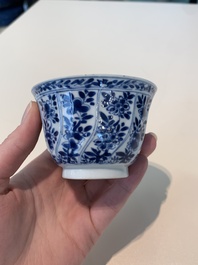 18 Chinese blue and white cups and 16 saucers with floral design, jade mark, Kangxi
