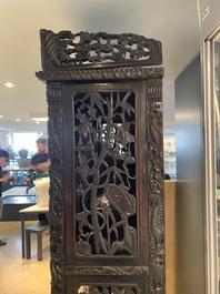 A richly carved Chinese hongmu display cabinet, Canton, 19th C.