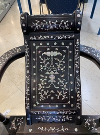 A Chinese mother-of-pearl-inlaid hongmu reclining armchair with a retractable footrest, Canton, 19th C.