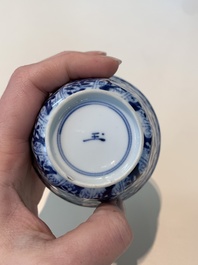18 Chinese blue and white cups and 16 saucers with floral design, jade mark, Kangxi