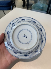 18 Chinese blue and white cups and 16 saucers with floral design, jade mark, Kangxi