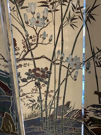 A Chinese polychrome lacquered wooden eight-panel folding screen with a pond scene, 19/20th C.