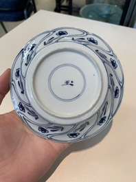 18 Chinese blue and white cups and 16 saucers with floral design, jade mark, Kangxi