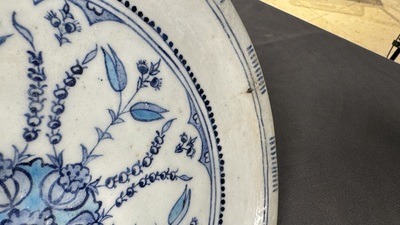 A blue, white and turquoise Iznik pottery dish with floral design, Turkey, late 16th C.