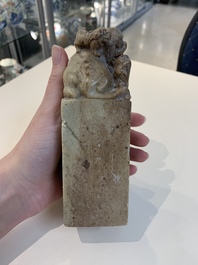Two Chinese snuff bottles, four soapstone seals and a lacquer covered box, 20th C.