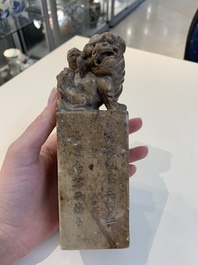 Two Chinese snuff bottles, four soapstone seals and a lacquer covered box, 20th C.