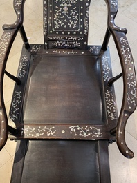 A Chinese mother-of-pearl-inlaid hongmu reclining armchair with a retractable footrest, Canton, 19th C.