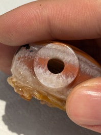 A collection of ten Chinese agate snuff bottles, 20th C.
