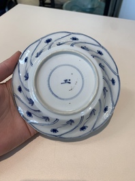 18 Chinese blue and white cups and 16 saucers with floral design, jade mark, Kangxi