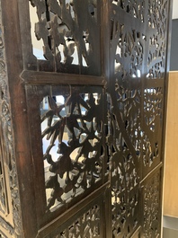 A richly carved Chinese hongmu display cabinet, Canton, 19th C.
