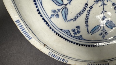 A blue, white and turquoise Iznik pottery dish with floral design, Turkey, late 16th C.