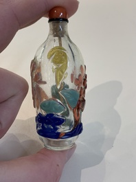 A collection of 14 Peking glass snuff bottles, 19/20th C.