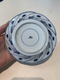 18 Chinese blue and white cups and 16 saucers with floral design, jade mark, Kangxi