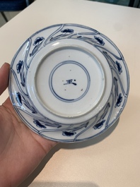 18 Chinese blue and white cups and 16 saucers with floral design, jade mark, Kangxi