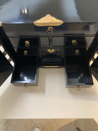 A rare Japanese black-lacquered cabinet with finely engraved gilt mounts, Edo, late 17th C.