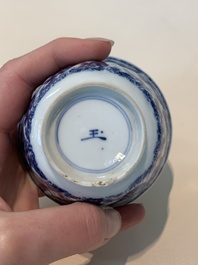 18 Chinese blue and white cups and 16 saucers with floral design, jade mark, Kangxi
