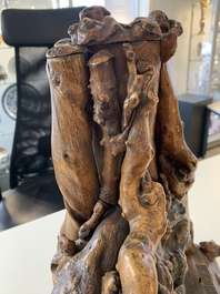 A Chinese carved wooden group and a natural root sculpture, 20th C.