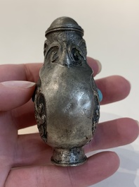 Two Chinese snuff bottles, four soapstone seals and a lacquer covered box, 20th C.