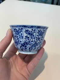18 Chinese blue and white cups and 16 saucers with floral design, jade mark, Kangxi