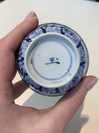 18 Chinese blue and white cups and 16 saucers with floral design, jade mark, Kangxi