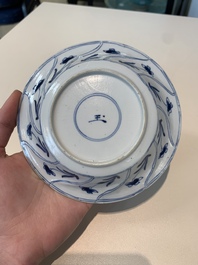 18 Chinese blue and white cups and 16 saucers with floral design, jade mark, Kangxi