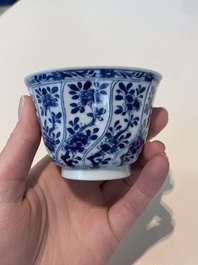 18 Chinese blue and white cups and 16 saucers with floral design, jade mark, Kangxi