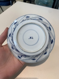 18 Chinese blue and white cups and 16 saucers with floral design, jade mark, Kangxi
