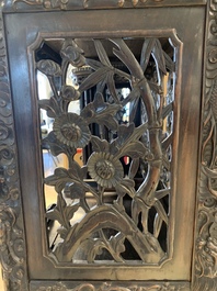 A richly carved Chinese hongmu display cabinet, Canton, 19th C.