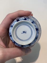 18 Chinese blue and white cups and 16 saucers with floral design, jade mark, Kangxi