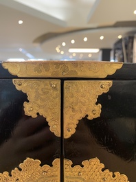 A rare Japanese black-lacquered cabinet with finely engraved gilt mounts, Edo, late 17th C.
