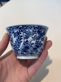 18 Chinese blue and white cups and 16 saucers with floral design, jade mark, Kangxi