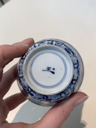 18 Chinese blue and white cups and 16 saucers with floral design, jade mark, Kangxi