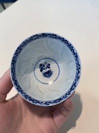 18 Chinese blue and white cups and 16 saucers with floral design, jade mark, Kangxi