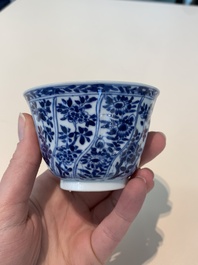 18 Chinese blue and white cups and 16 saucers with floral design, jade mark, Kangxi