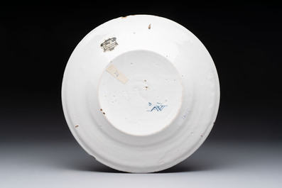 A blue and white Dutch Delft armorial plate with the arms of White for the English market, late 17th C.