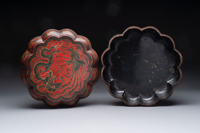 A Chinese gilt-lacquered &lsquo;dragon and phoenix&rsquo; box and cover, 20th C.