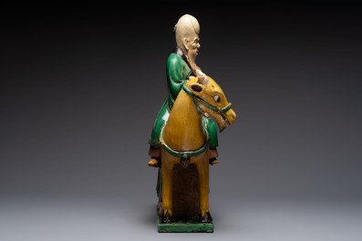 A Chinese sancai-glazed 'Shoulao riding a deer' group, Qing