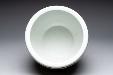 A Chinese famille rose yellow-ground 'pheasant and peony' scroll pot, 19th C.